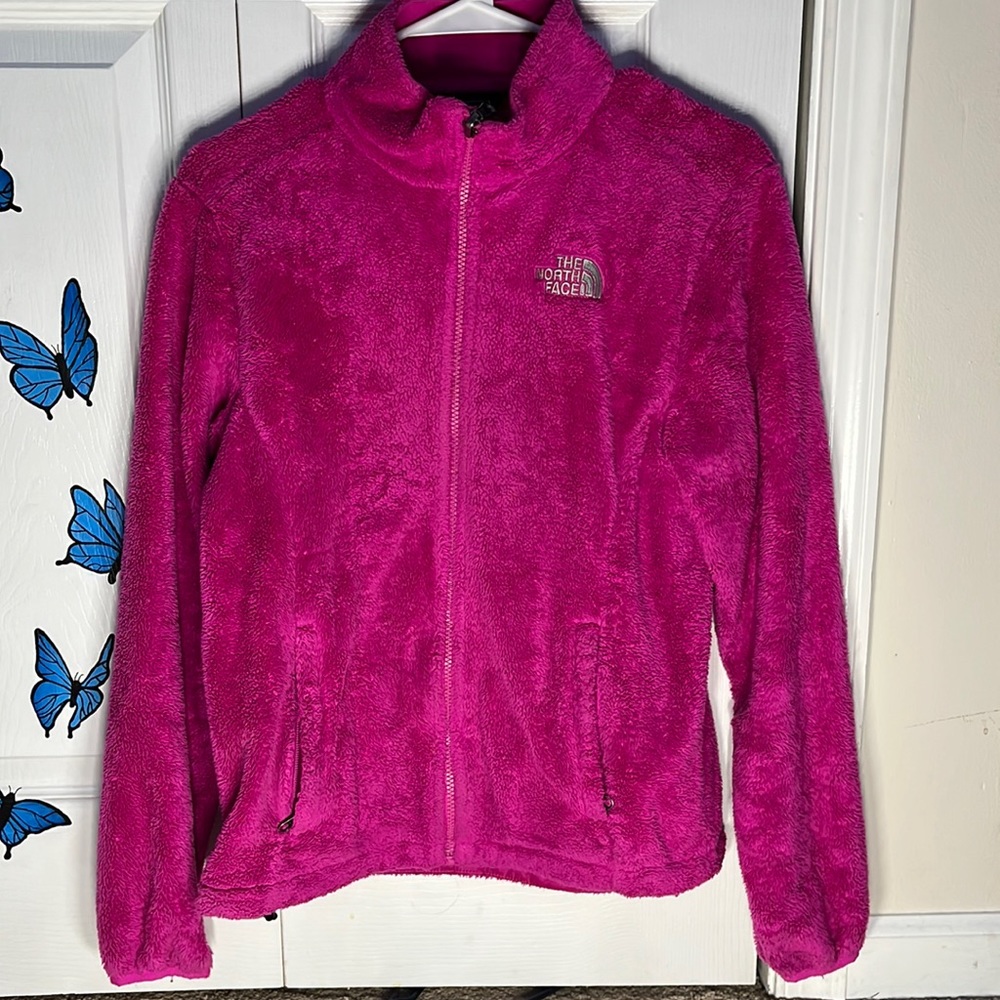 The North Face magenta zip up sweater in size women’s S